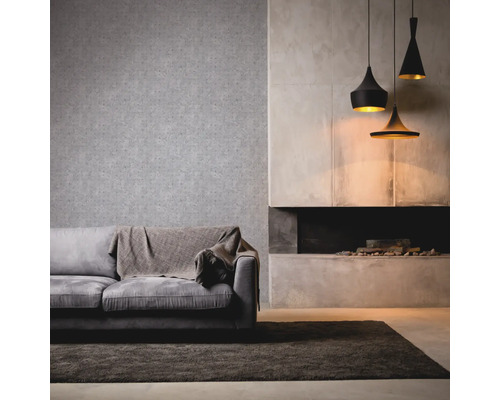 Salon avec canapé, tapis, papier peint et suspensions