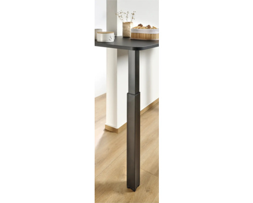 Vue détaillée d''une table réglable en hauteur avec un pied en métal foncé