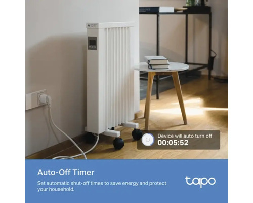 Radiateur mobile blanc avec minuterie et roulettes dans un espace de vie