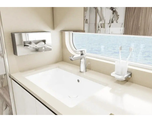 Salle de bain moderne avec lavabo, robinet et distributeur de savon