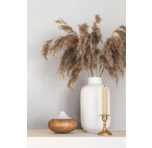 Dekorative Anordnung mit einem Aroma Diffuser, Kerzenständer mit Kerze und einer Vase mit Ziergras