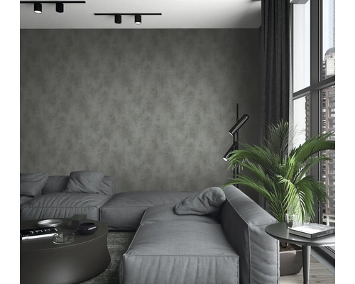 Salon moderne avec canapé gris, lampadaire et plante d''intérieur