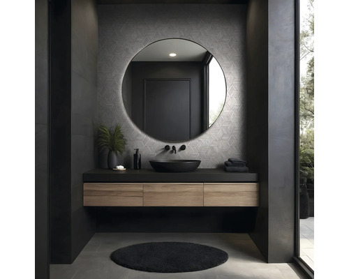 Modernes Badezimmer mit rundem Spiegel, Waschtisch und dunklen Akzenten