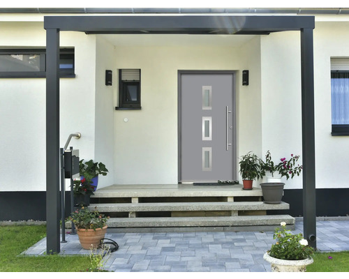 Porte d''entrée avec auvent et escalier menant à l''entrée