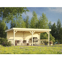 Pavillon en bois avec espace barbecue et coin salon dans le jardin