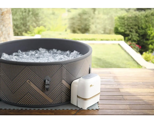 Bain à remous rond gonflable avec unité de commande correspondante à l''extérieur.