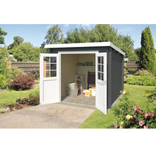 Abri de jardin avec double porte dans le jardin