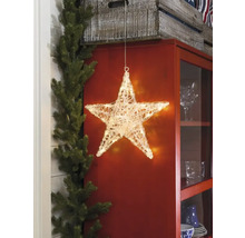 Étoile lumineuse décorative devant un placard
