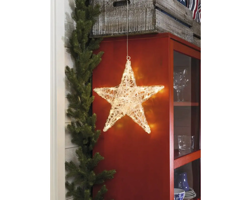 Étoile lumineuse décorative devant un placard
