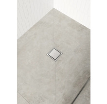 Salle de bain avec carrelage au sol et siphon de douche carré