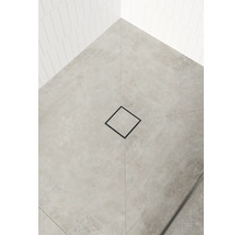 Sol de salle de bain avec carrelage et siphon de douche carré