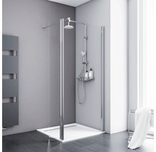 Douche avec paroi en verre, pommeau de douche et étagère dans la salle de bain