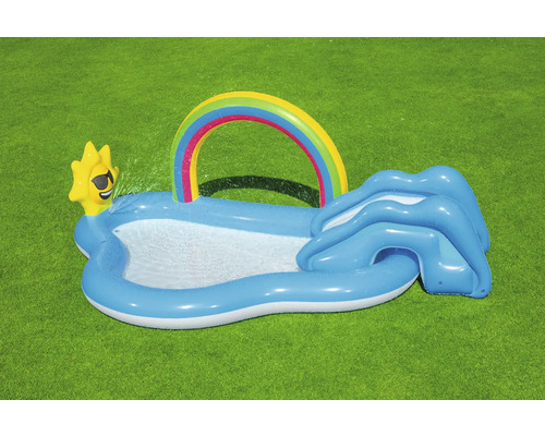 Aufblasbares Kinderplanschbecken mit Regenbogen und Rutsche im Garten