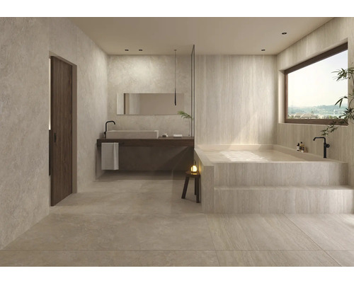 Salle de bain lumineuse avec baignoire, lavabo et miroir pour un design moderne