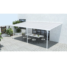 Pergola avec table et chaises à l''extérieur.