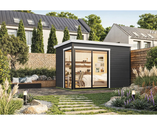 Abri de jardin moderne avec portes coulissantes et aménagement paysager élégant.
