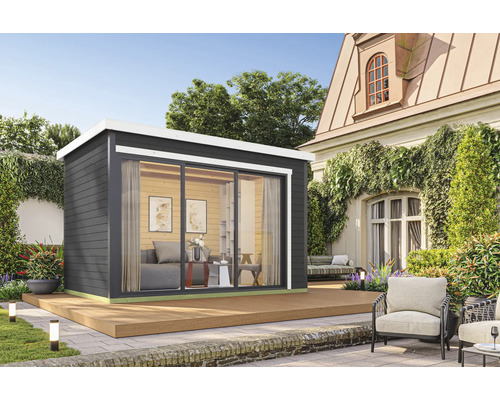 Abri de jardin moderne avec porte coulissante et terrasse dans le jardin.