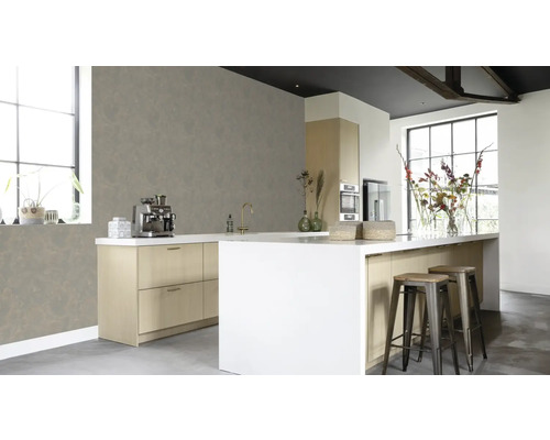 Cuisine moderne avec îlot, sièges et appareils électroménagers