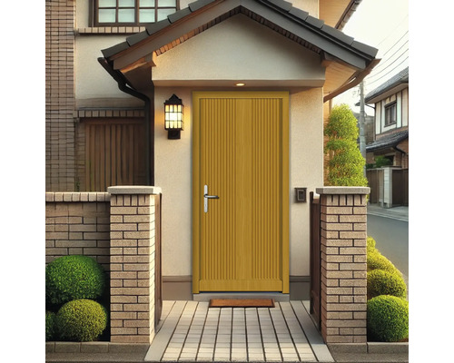 Extérieur d''une maison avec porte d''entrée, mur en briques et jardin soigné