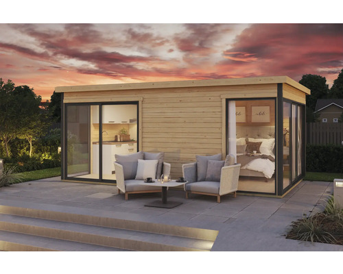 Maison de jardin moderne avec cuisine et chambre, équipée de sièges sur la terrasse