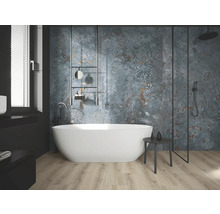 Salle de bains moderne avec baignoire îlot, douche et carreaux muraux structurés