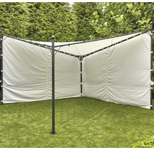 Tente de jardin avec parois en tissu sur une pelouse