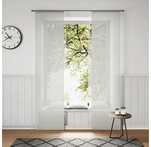 Heller Raum mit Schiebevorhängen, Uhr und Dekoration