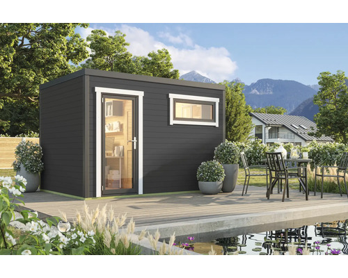 Abri de jardin avec fenêtre et porte vitrée sur une terrasse en bois au bord d'un étang