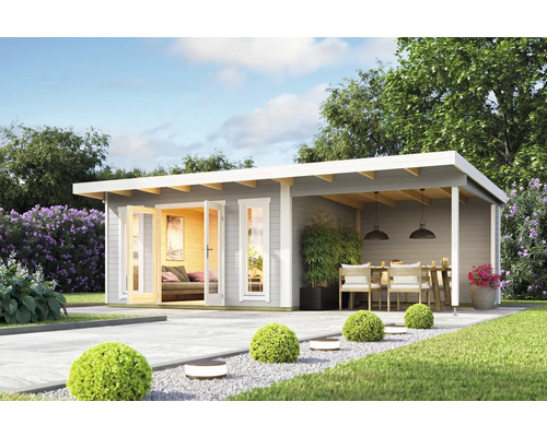 Scène de jardin avec abri de jardin en bois et terrasse avec coin salon