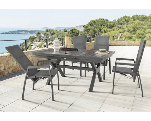 Ensemble de meubles de jardin Destiny Costa Garda 4 places 5 pces anthracite, aluminium + Textilene + céramique, extractible, empilable, dossier ajustable Table de jardin avec chaises sur une terrasse avec vue sur la mer.