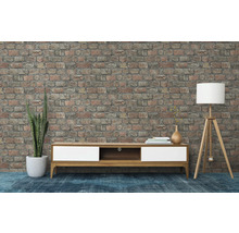 Wohnzimmer mit modernem TV-Schrank vor einer Ziegelwand