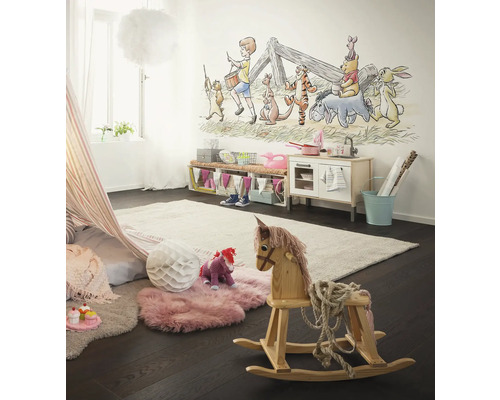 Chambre d''enfant avec jouets, tapis et peinture murale