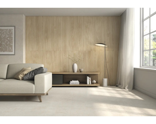 Salon avec canapé, buffet et revêtement mural aspect bois