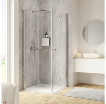 Scène de salle de bains moderne avec cabine de douche, lavabo et miroir