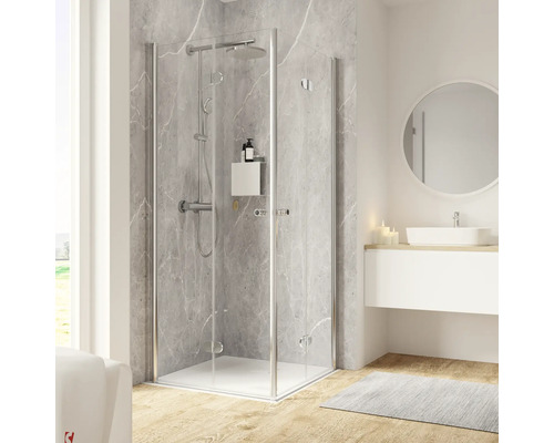 Douche accès d'angle avec porte à vantaux pliants et pivotants SCHULTE Garant 2.0 75 x 120 cm profilé chrome verre transparent réversible poignée tampon Scène de salle de bains moderne avec cabine de douche, lavabo et miroir