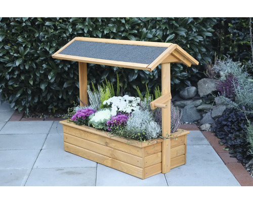 Holzblumenkasten mit Dach und Blumen