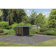 Abri de jardin avec annexe sur fond de verdure.