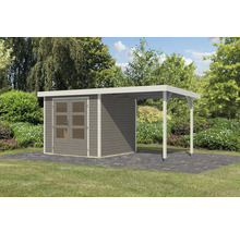 Abri de jardin avec annexe sur pavage en pierre devant une haie verte