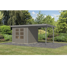 Abri de jardin avec annexe sur une pelouse