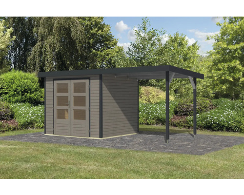 Abri de jardin avec annexe en bois dans le jardin