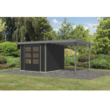 Abri de jardin avec annexe sur une pelouse