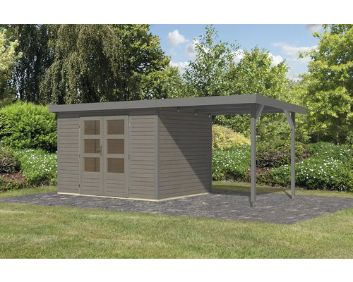 Abri de jardin en bois avec extension sur pavés