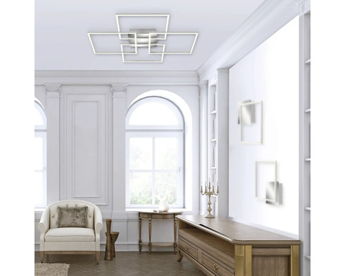 Salon avec plafonnier moderne aux formes géométriques