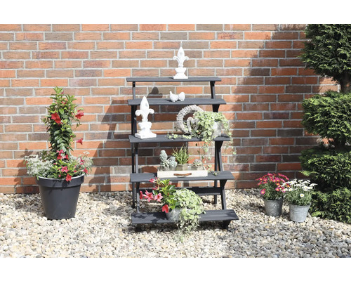 Étagère de jardin décorative en bois avec objets décoratifs et plantes