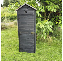 Armoire à outils étroite en bois avec porte et toit en métal dans le jardin
