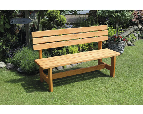 Banc de jardin en bois dans le jardin
