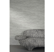 Décoration murale avec structure en marbre et canapé gris