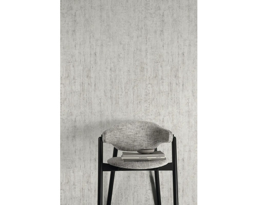 Gros plan d''un papier peint texturé blanc avec une chaise