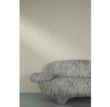 Gros plan d''un papier peint à motifs et d''un canapé