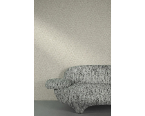 Gros plan d''un papier peint à motifs et d''un canapé